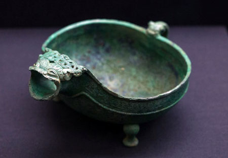 copper basin with three fishes