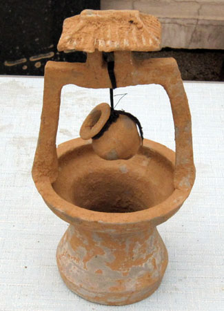 pottery model of a well