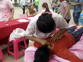 Our doctor is treating stiff neck with special technique of Yao Medicine.